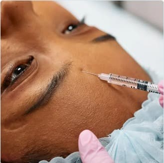 Botox injection being administered
